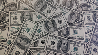 Top down image of 100-dollar bills